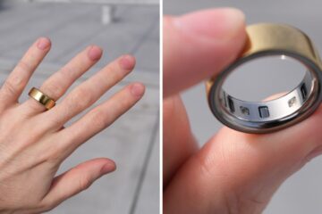 Gold Oura RIng 4 on a white hand